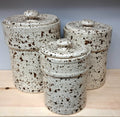 Set of three ceramic canisters with speckled glaze (Texas)