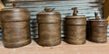 Set of four rustic ceramic canisters with animal lids.